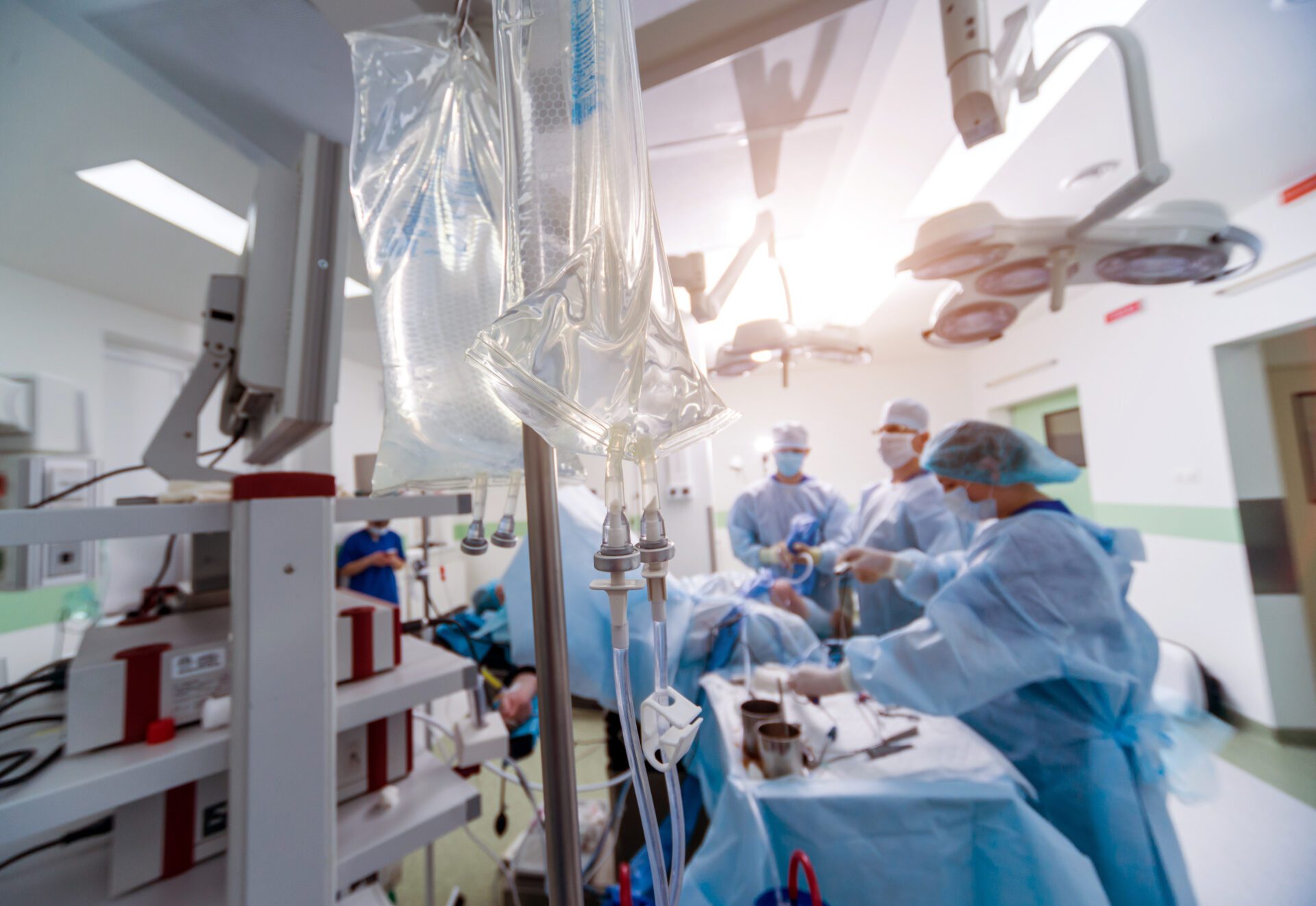 Arthroscope surgery. Orthopedic surgeons in teamwork in the operating room Festival of Trees event space